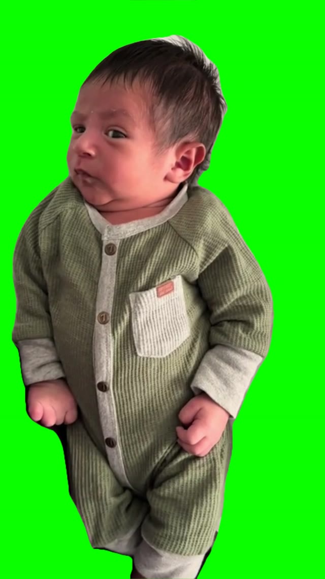 Baby giving side eye green screen