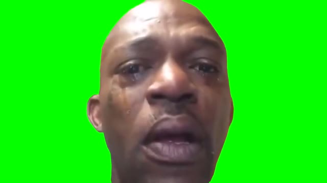 Black man crying green screen