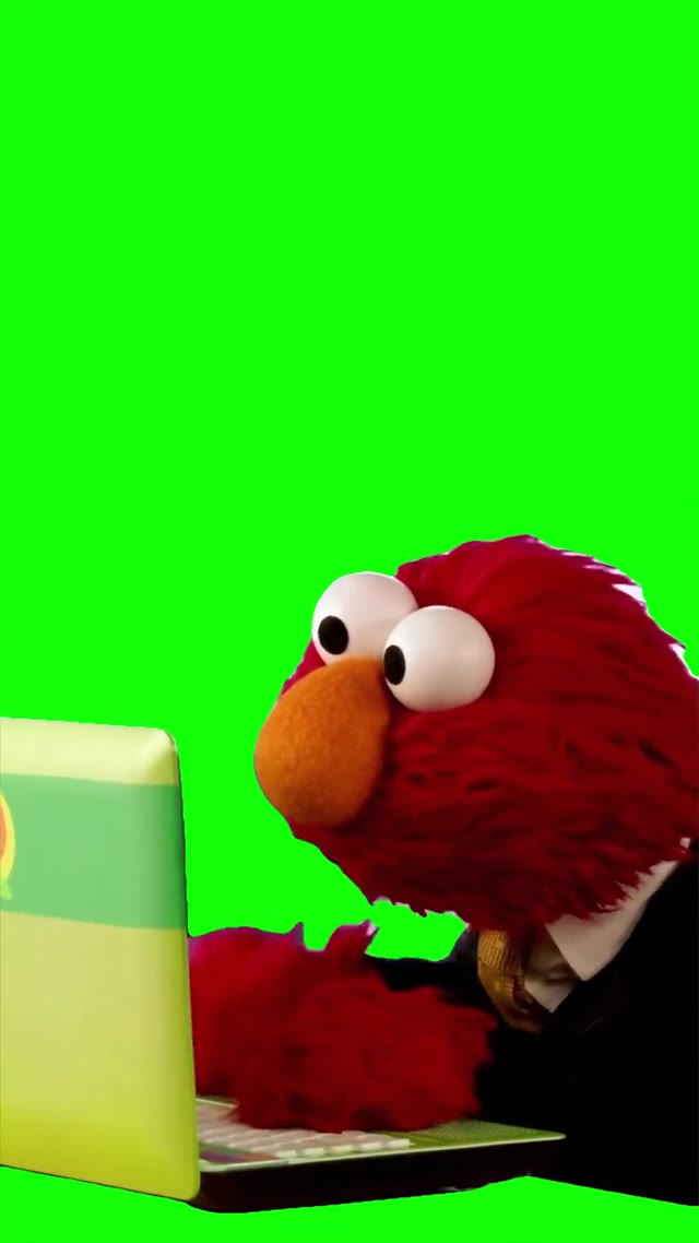Elmo typing on computer green screen