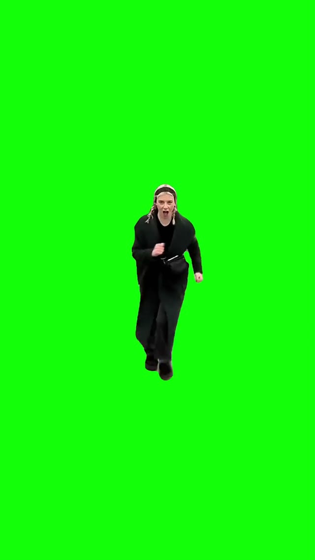 Girl running up green screen
