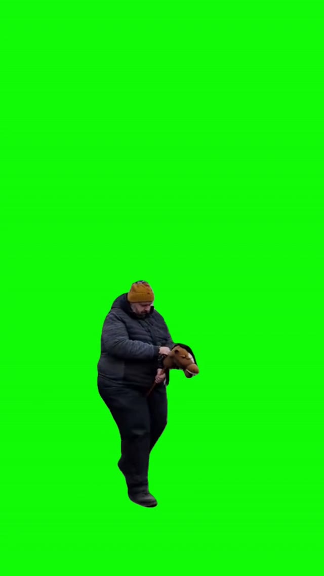 Guy riding a fake horse  green screen