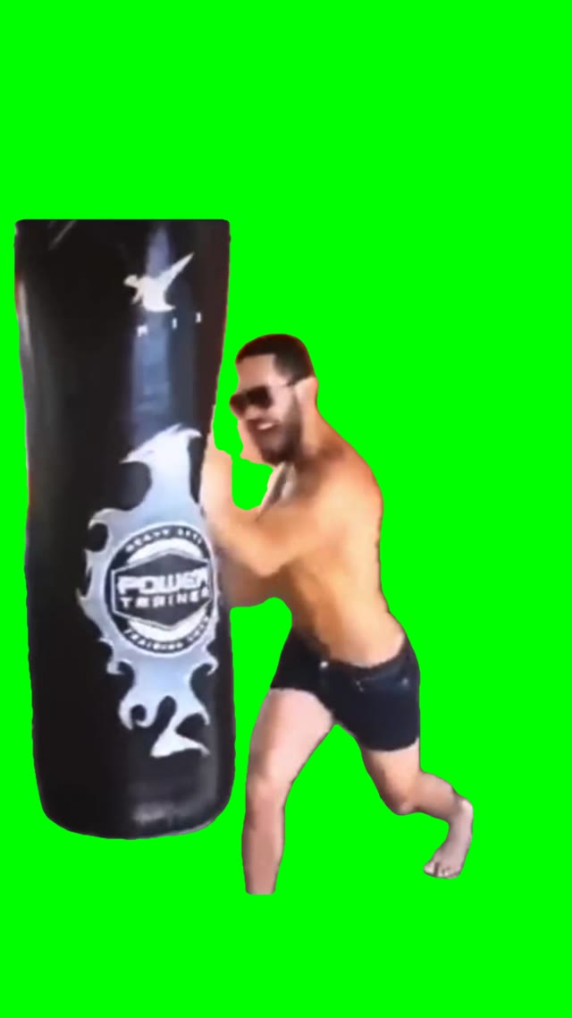 Guy slightly hits punching bag green screen