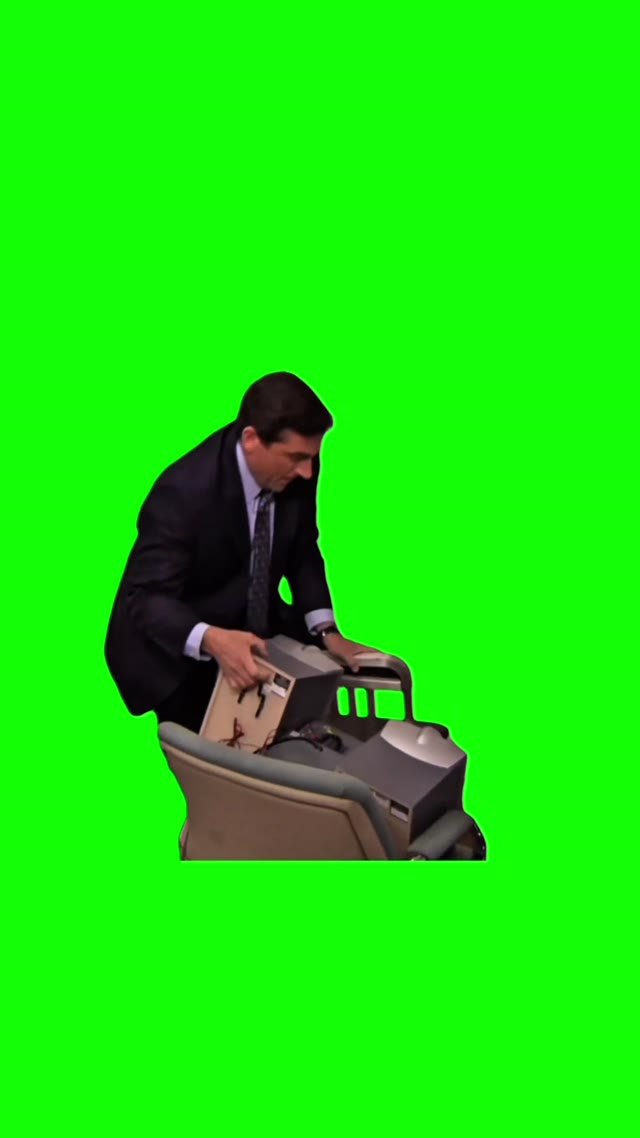 Michael holds speaker green screen